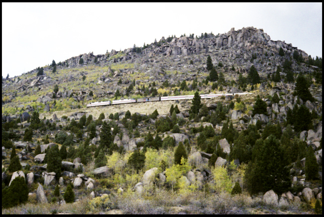 BN Train No. 17, with AMT 244-247  heading into Butte, MT.