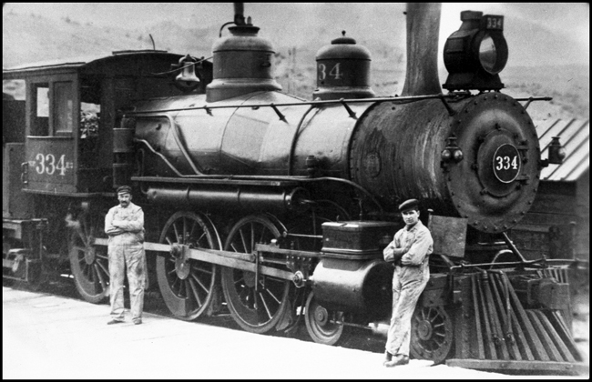 Engineer and fireman pose at the end of a run down the Yellowstone branch.  Strong, capable, and a little cocky, they have done their job today and know they can handle a 4-6-0 in the mountains.  The engine is an 1889 Baldwin.
