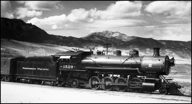 The tourist season is about over, and the passenger train to Yellowstone will be running only a few more days this season.   Power on this day a little past Labor Day is a W Mikado, ALCO class of 1905.