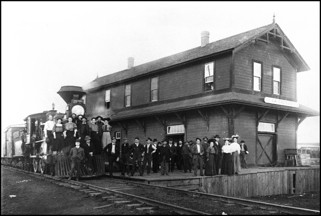 We do not know the occasion, but there is a crowd at the depot and many of them are posing on the locomotive.  LaCrosse became a major railroad center on the Mississippi River and is still a major crossroads of traffic today.