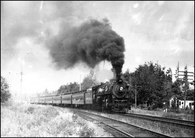 A Northern at speed and seven old coaches on a hot summer day with little indication that this is a last run.  2626 is strutting one last time for her many fans and friends.  Mainline steam was about over on the NP, but there would be a few more railfan outings on the west en.  A few more freights and worktrains in the east.