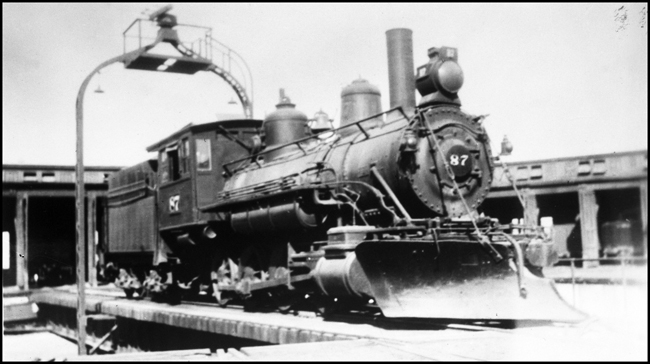 An old F-3 Consolidation takes one of its last spins on a turntable.  It's an 1889 product of New York Locomotive Works, a builder of about 700 engines in the late Nineteenth century.