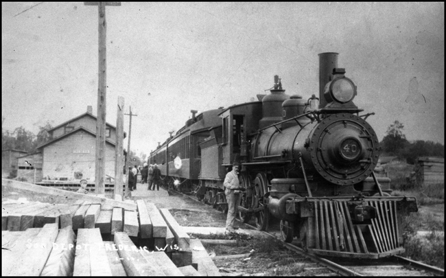 SOO No. 61 and SOO locomotive 40 at Frederic, WI.