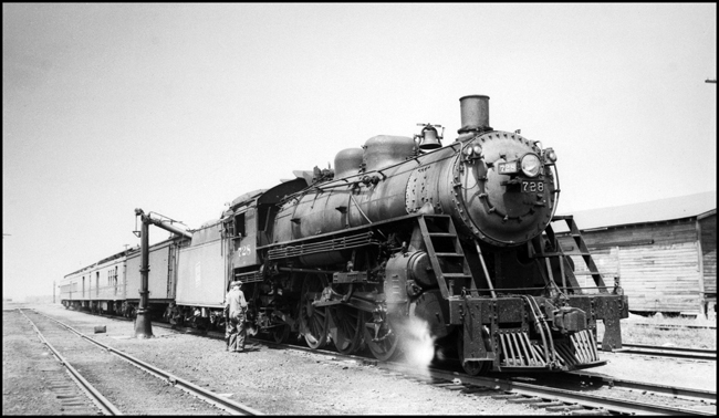 SOO 728 on Train No. 2 at Owen, WI, taking water.