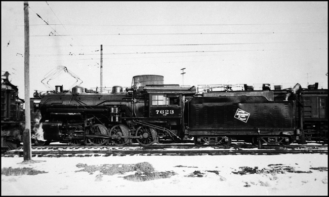 MILW 7623, 2-8-0 locomotive in servicing area at Tacoma yard 