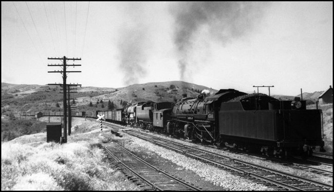  NP 5101, Class Z-6 and NP 4501, Class Z-4 with caboose in between as train is helped up Bozeman Hill.