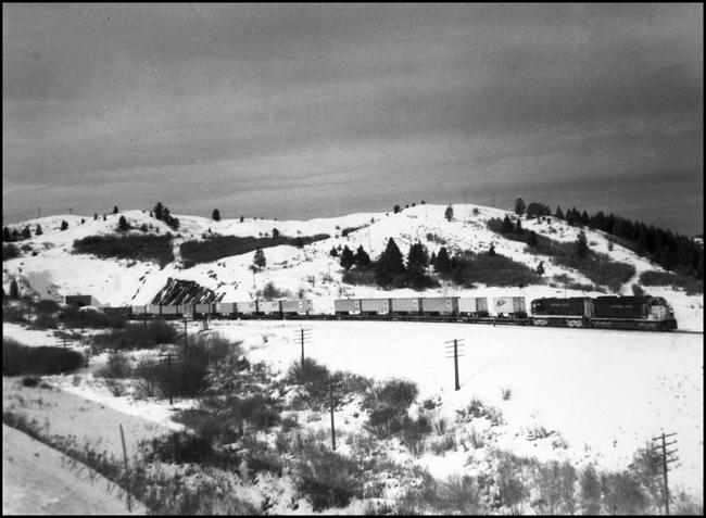 NP X3605-2525E with Tokyo Express passing Muir, MT, just out of the Bozeman Tunnel.
