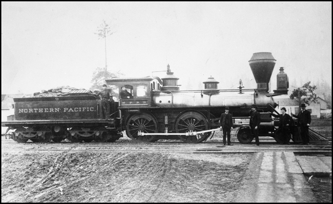 NP 9, 4-4-0 with crew members posing.