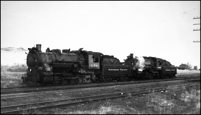 NP 1176 and NP 1180, both Class G-2,  westbound double heading out of DeSmet, MT.