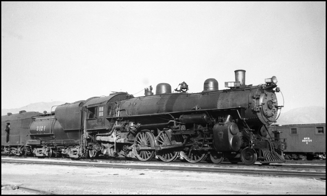 UP 3121, 4-6-2 locomotive on passenger train in Butte, MT.