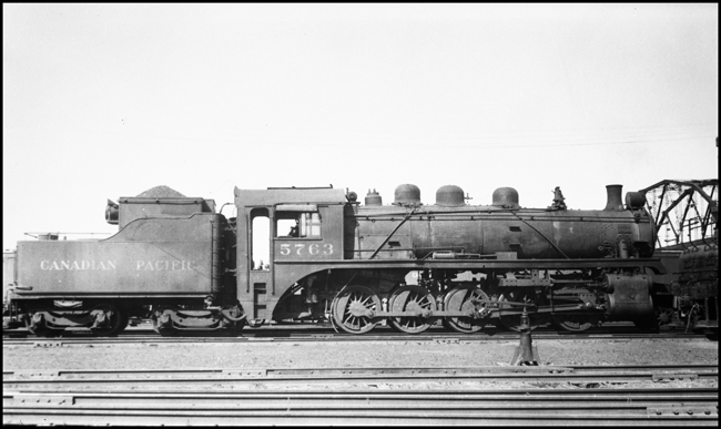 CPR 5763, 2-10-0 coaled and ready to go by an overpass bridge in Winnipeg, MB.