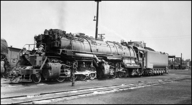DM&IR 227 , 2-8-8-4 Yellowstone type locomotive being serviced at Two Harbors.  This locomotive weighed 566 tons and was 128 foot long.  It could consume 12 tons of coal an hour and evaporate 12,000 gallons of water per hour.  DM&IR 227 could develop 6,000 drawbar horsepower.