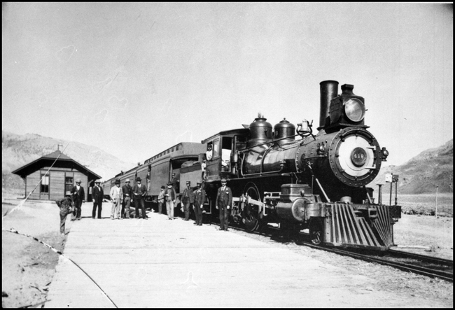 NP 418, Class D-5, formerly NP 707, on Park Branch train with by-standers and crew posing for picture at Cinnabar, MT