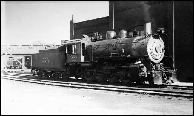 C&S 634, 0-8-0 in front of Denver roundhouse.  Based on the Santa Fe lettering on tender this locomotive must have been working on a joint properties assignment.  