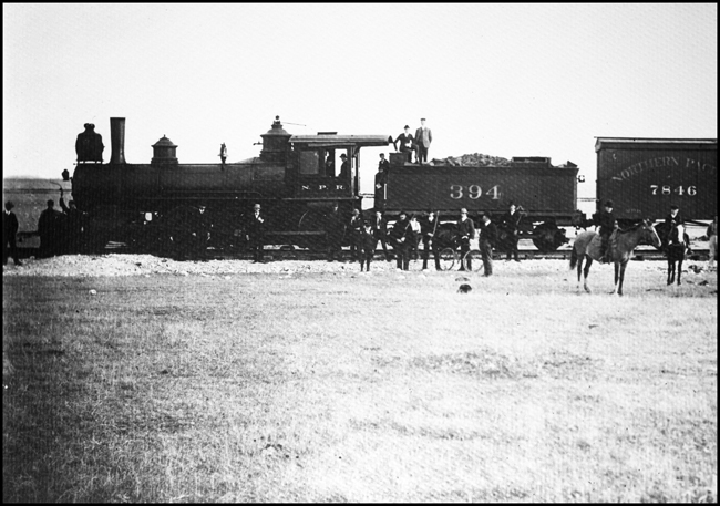 NP 394, Class E, with first freight train into Lewistown, MT, on Montana RR.
