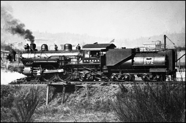 OWRR&N 102 , 4-4-2 locomotive, later renumbered to 3503,  between Union Station and Albine Yard in Portland.  Photo is from the Walter Heinzi collection by HH Arey.