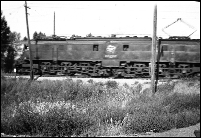 MILW 10307 electric locomotive passes camera near Willow Creek, MT