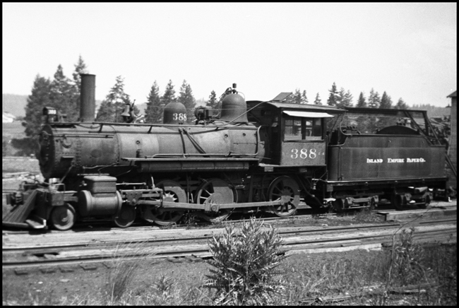 NP 388, Class E-4 at Millwood, WA.,  with a Inland Empire paper Company tender connected to the locomotive, implying the locomotive may have been leased to the paper company.