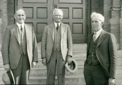 Presidents Atkinson, Hamilton, & Reid outside Montana Hall - Landscape center
