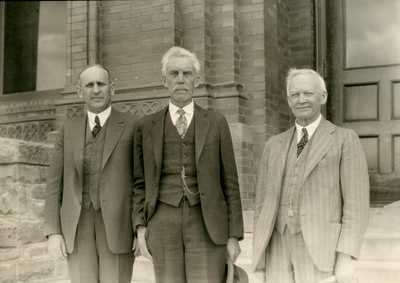 Presidents Atkinson, Reid, & Hamilton outside Montana Hall - Landscape left