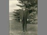 Alfred Atkinson in Front of Pine Tree