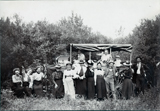 James R. Reid and Others posing near wagon, 1905