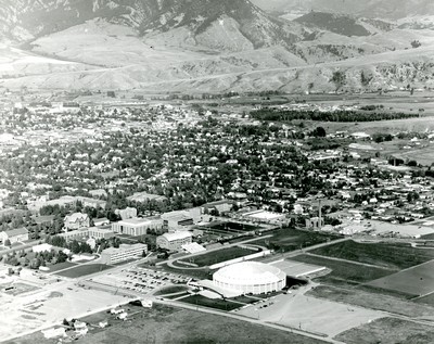 Aerial view of Montana State College Campus with the fieldhouse in the bottom center, 1960