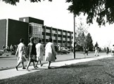 Women Walking in Front of Reid Hall on Montana State College's Campus