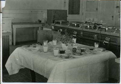 Place settings at the Domestic science lab, 1945