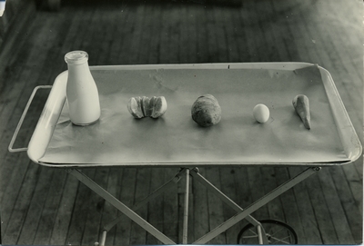 Food displayed on a tray, Domestic Science lab, 1945