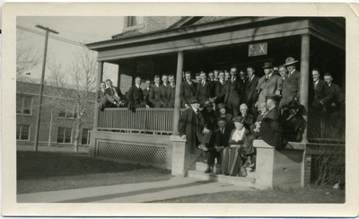 Sigma Chi members on the porch of their house, 1921