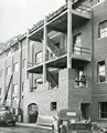 Construction of the outside staircase at Romney Gym