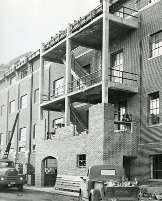 Construction of the outside staircase at Romney Gym