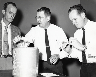 Three unidentified men at the D.M. Short Course, 1958/1959