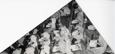 Students work at desks during Freshman Week