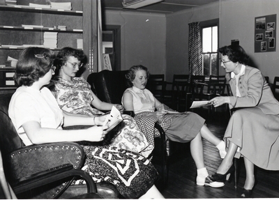 A group of women in a relaxed discussion