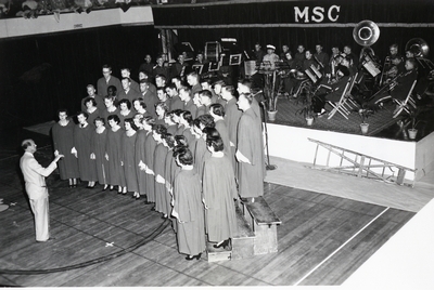 Montana State College Choir performing in Romney Gym