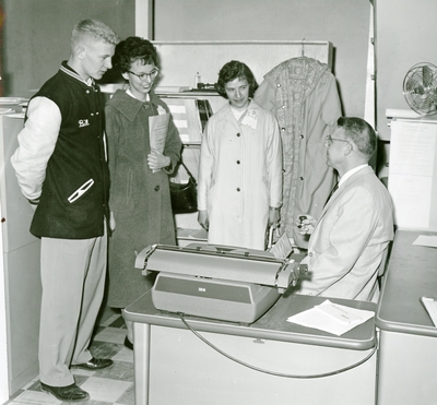 Three students and a professor during High School Week