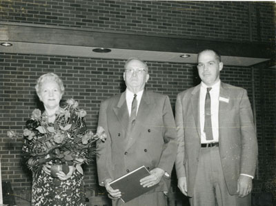 Two men and one woman at the Dairy Industry Short Course