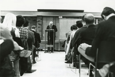 Henry Steele Commager at the front of a classroom, 1970