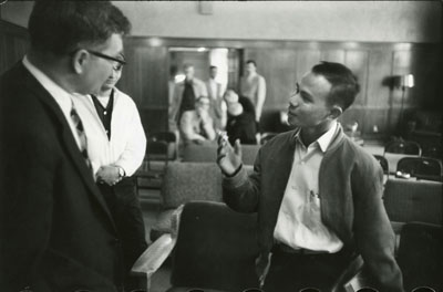 Senator Lee Metcalf talking with a young man at Montana State, 1958