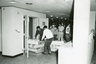 People unloading boxes for the Library move 1949/1950