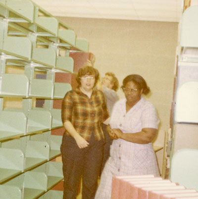Roberta Ward, Lucille Thompson and Donna Brown during the library move, November 1966