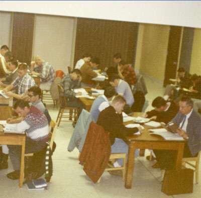 Students study in the lower lobby of the library during the move, November, 1966