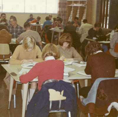 Students carry on studying during the library move, November, 1966