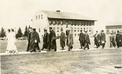 Graduates walking down the mall at Commencement, 1933