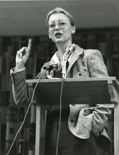Woman speaking at the Women Aware Conference.