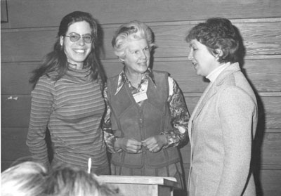 Three women at the Women Aware Conference