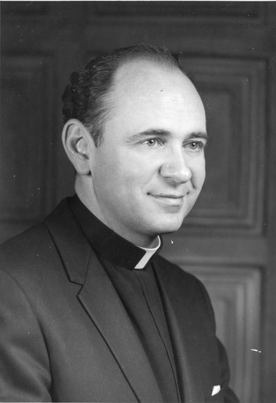 Portrait of Father Edward E Courtney during Religious Emphasis Week, 1964
