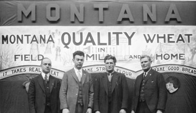 A.J. Ogaard, W.H. Jones, L.E. Peterson and C. Edson Smith at the County Fair
